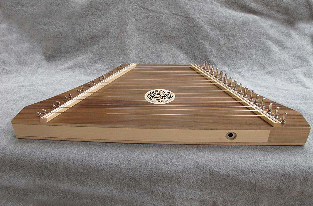 Custom Lap Harp in walnut with pickup on bottom rail.